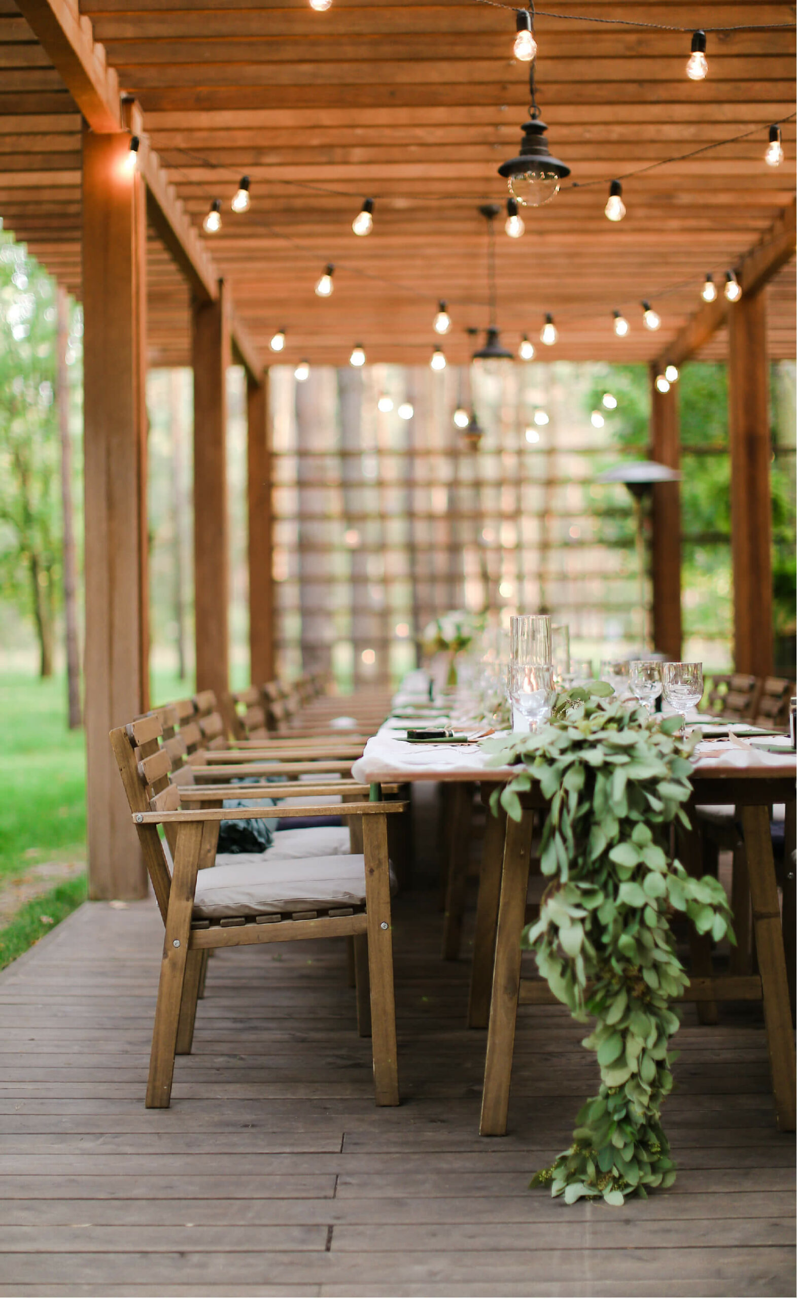 image of an outdoor wedding table with lights above